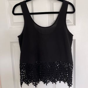 Black summer top with embroidered hem